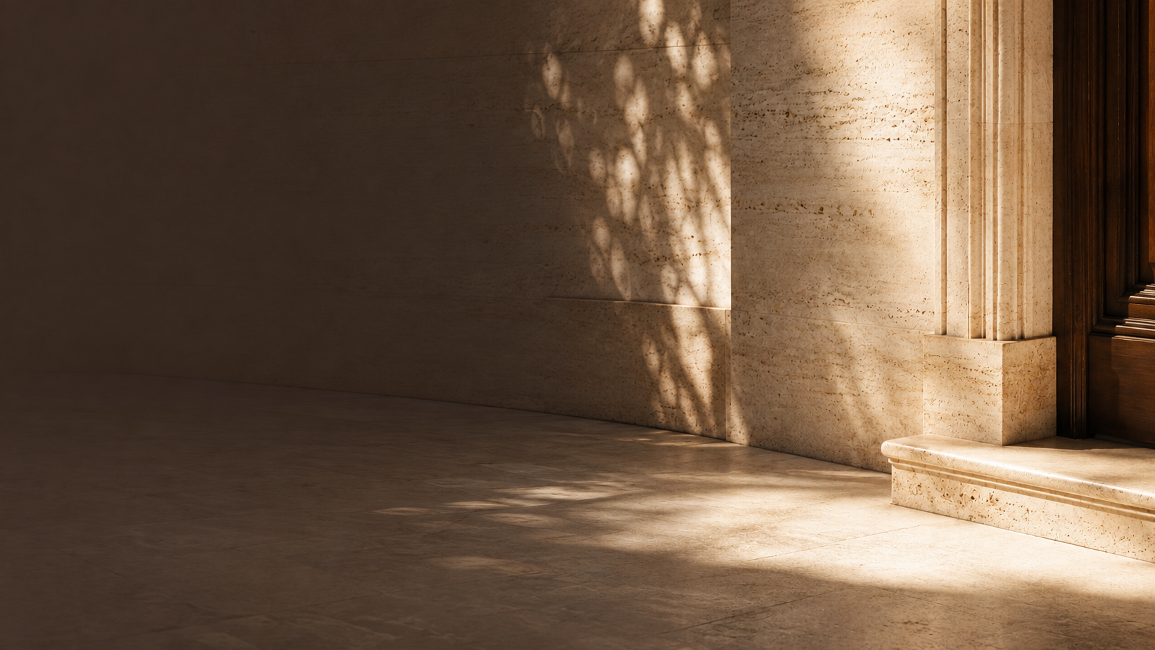 Sunlit stone column and doorway